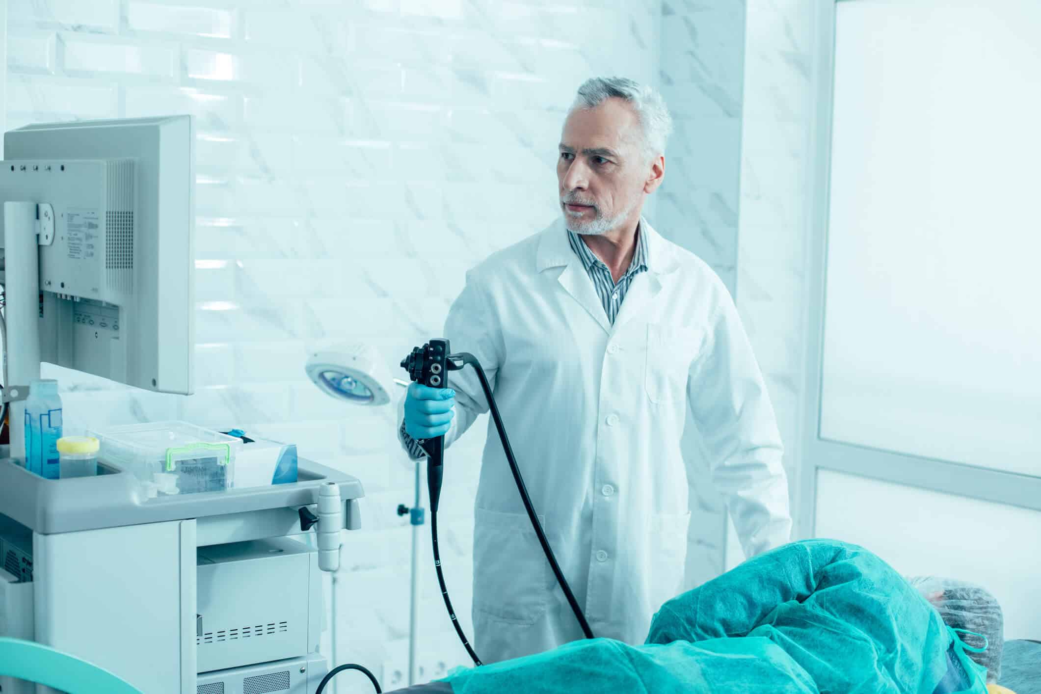 Patient lying down before an endoscopy procedure.